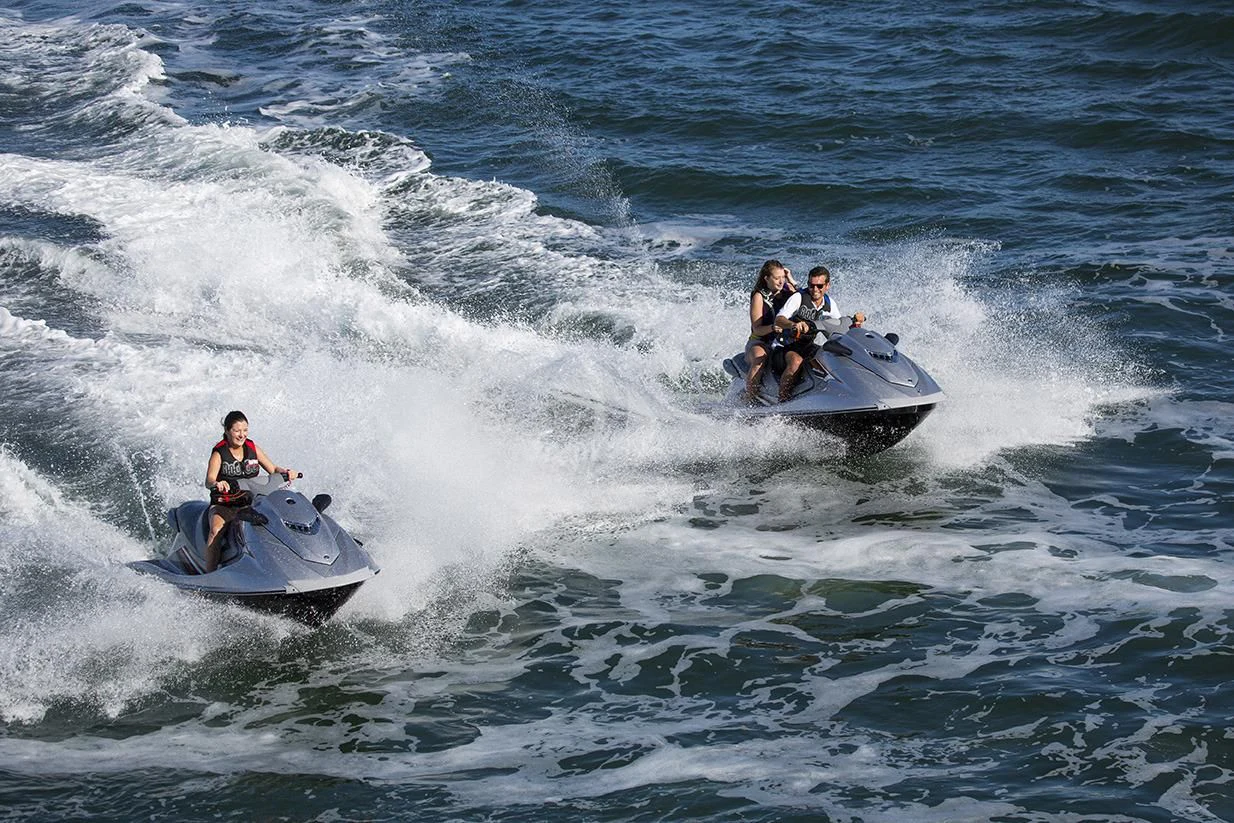 a group of people on a jet ski in the water aboard CHANTAL MA VIE Yacht for Sale