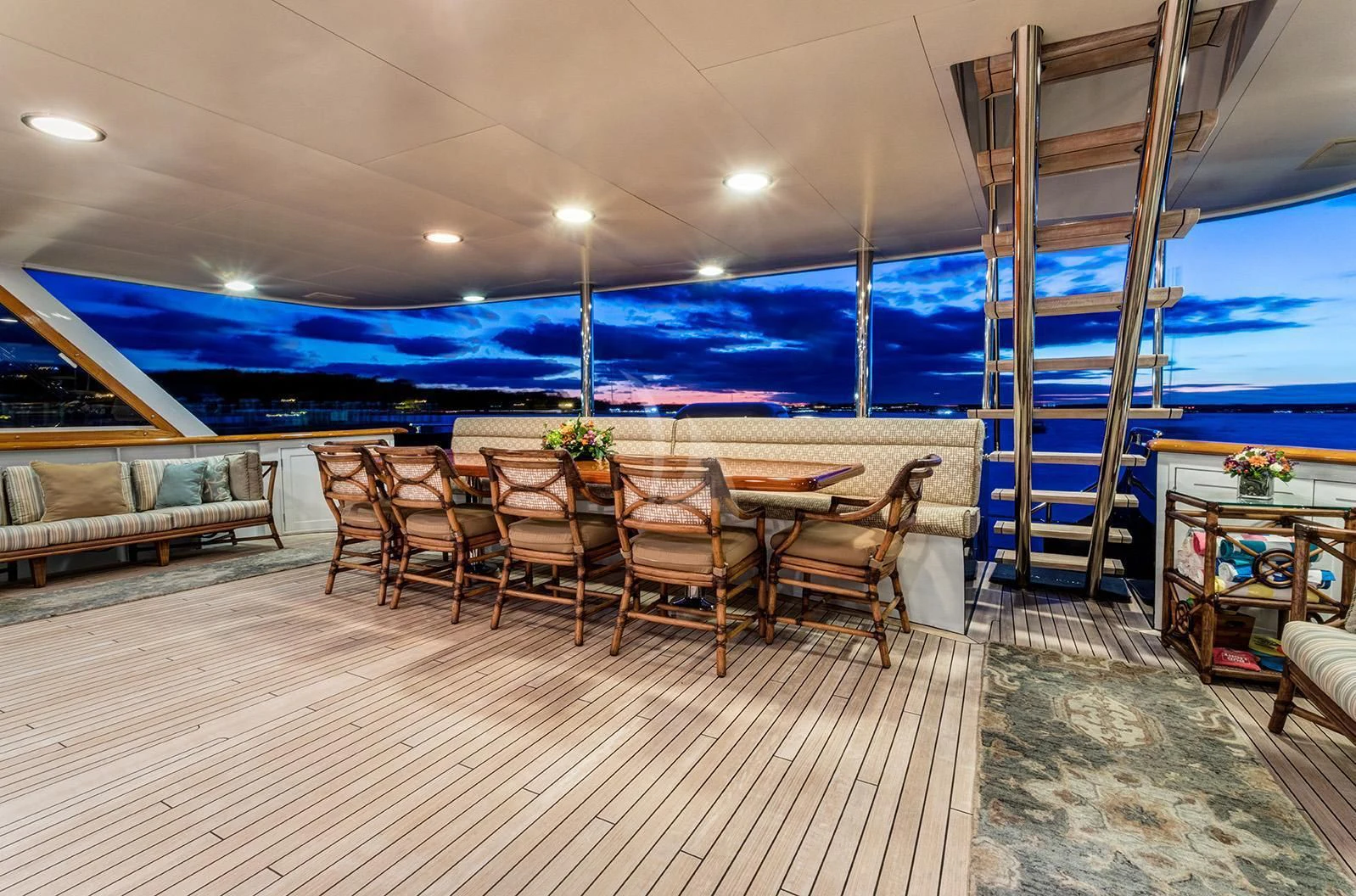 a room with a table and chairs aboard CHANTAL MA VIE Yacht for Sale