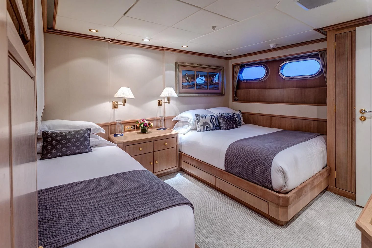 a couple of beds in a hotel room aboard CHANTAL MA VIE Yacht for Sale