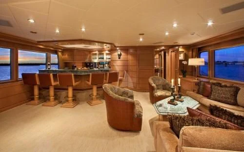 a living room with a large window aboard CHANTAL MA VIE Yacht for Sale