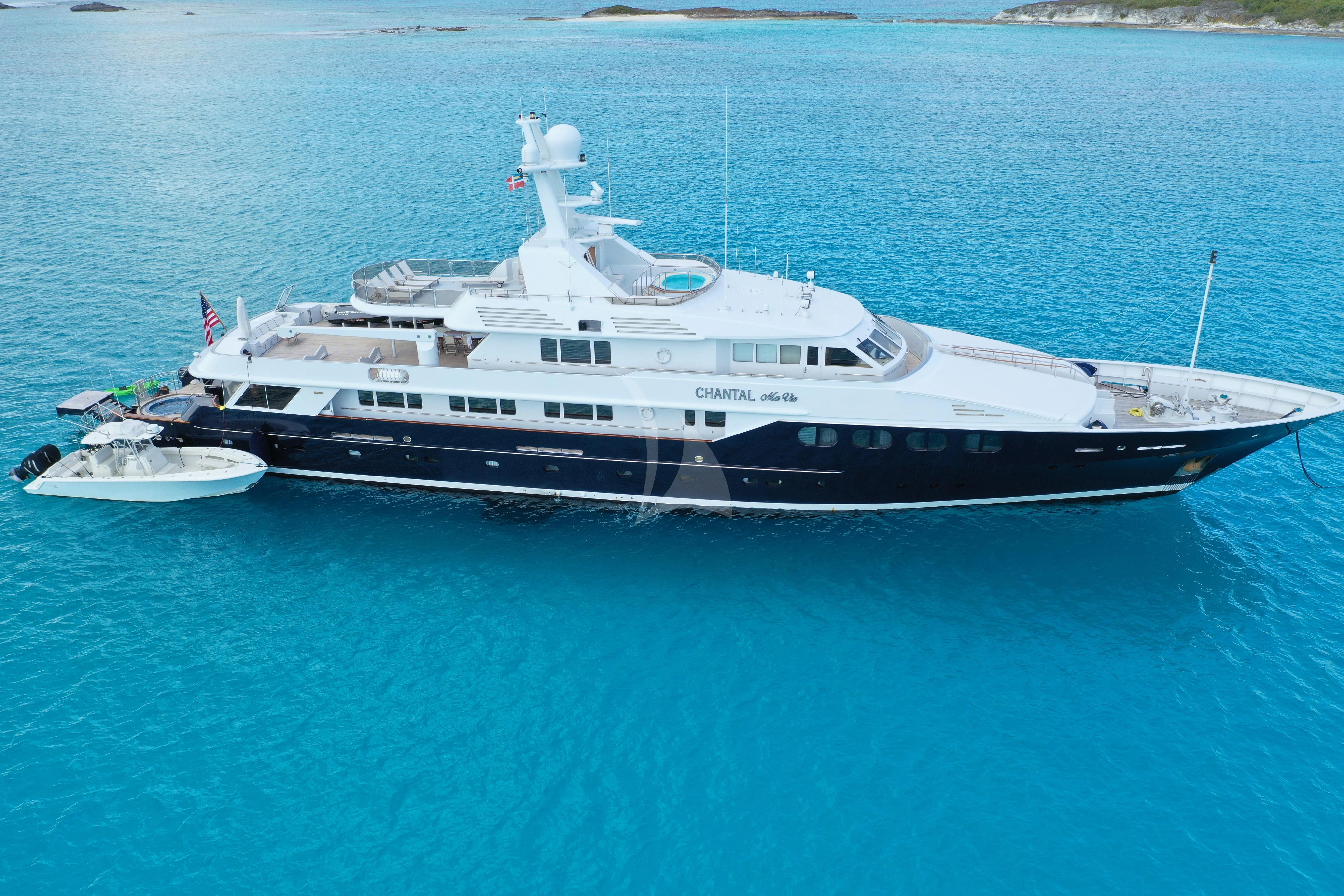 a large ship in the water aboard CHANTAL MA VIE Yacht for Sale