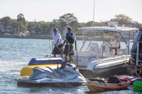 a group of people on a boat aboard CHANTAL MA VIE Yacht for Sale