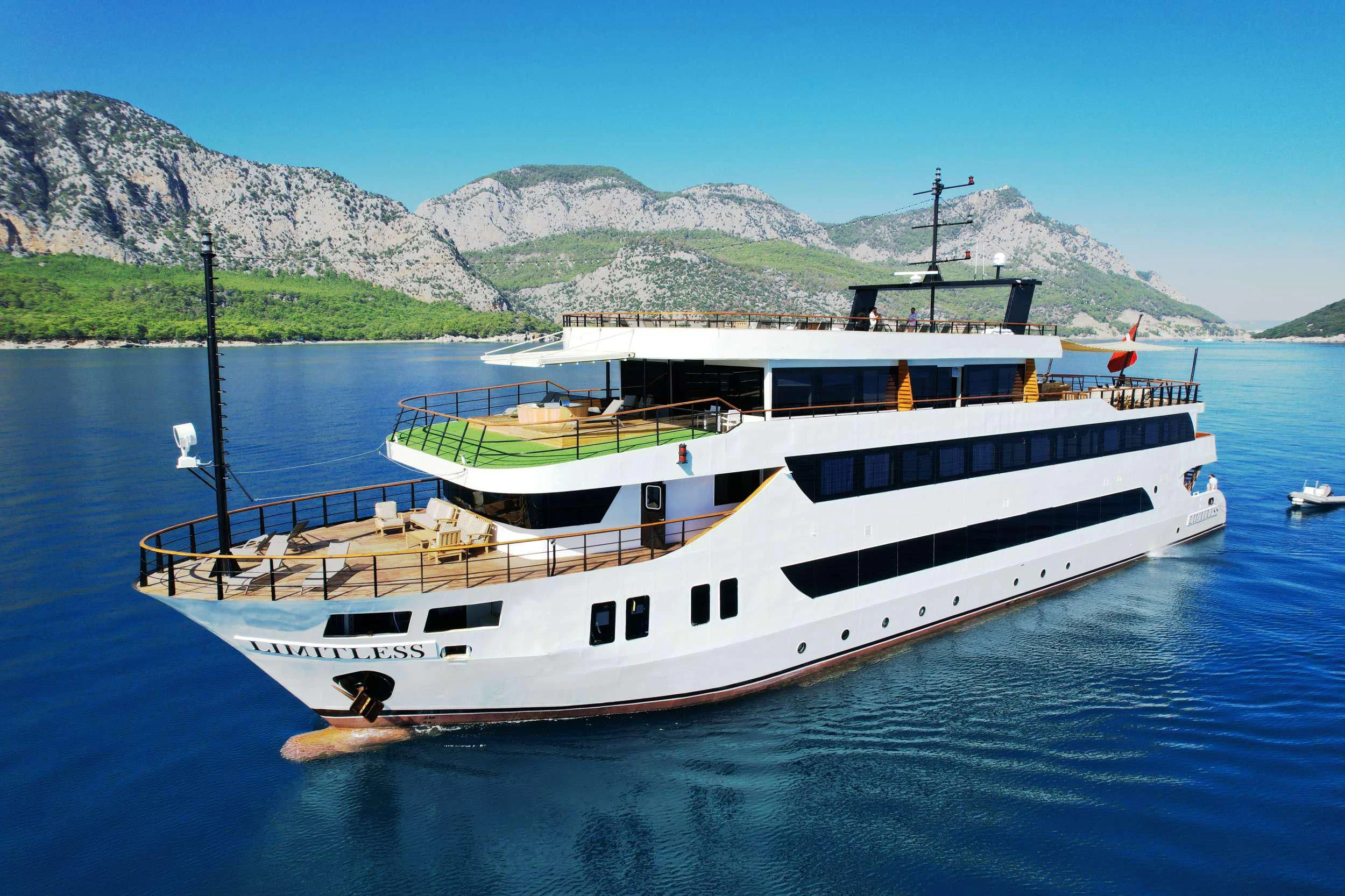 a boat in the water aboard LIMITLESS Yacht for Charter