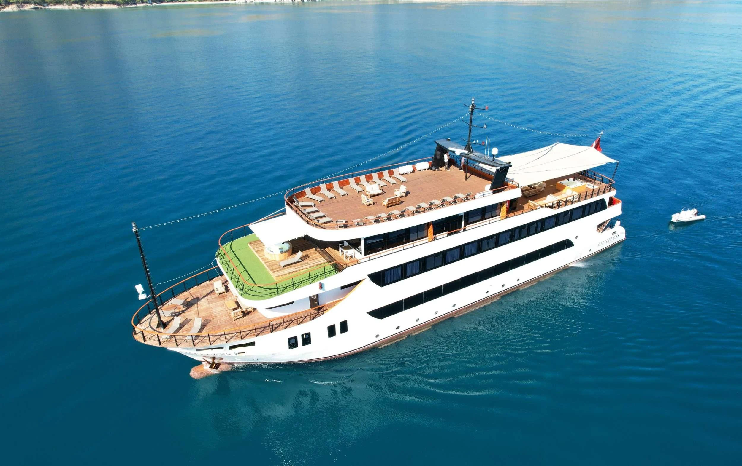 a ship in the water aboard LIMITLESS Yacht for Charter