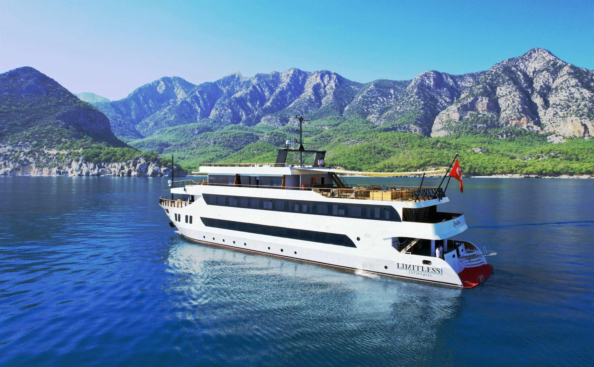 a boat on the water aboard LIMITLESS Yacht for Charter