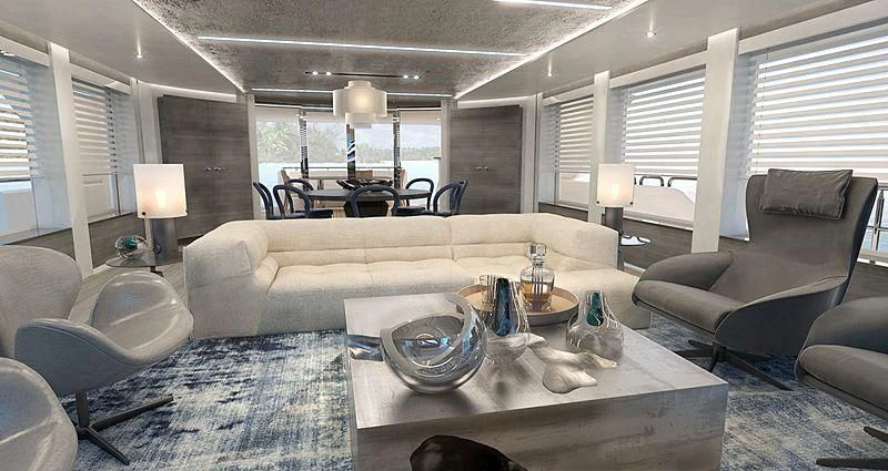 a living room with a couch and a table aboard PRICELESS Yacht for Sale