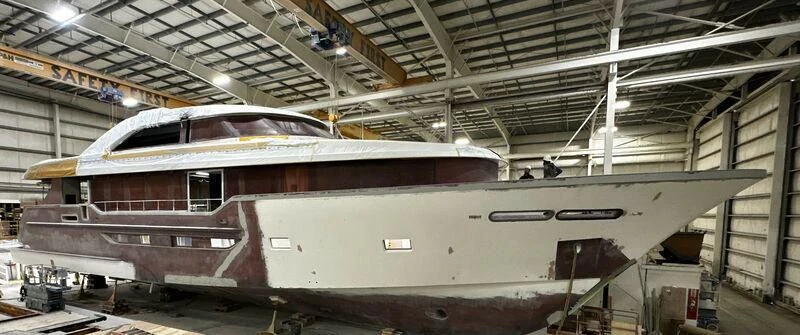 a train in a warehouse aboard PRICELESS Yacht for Sale