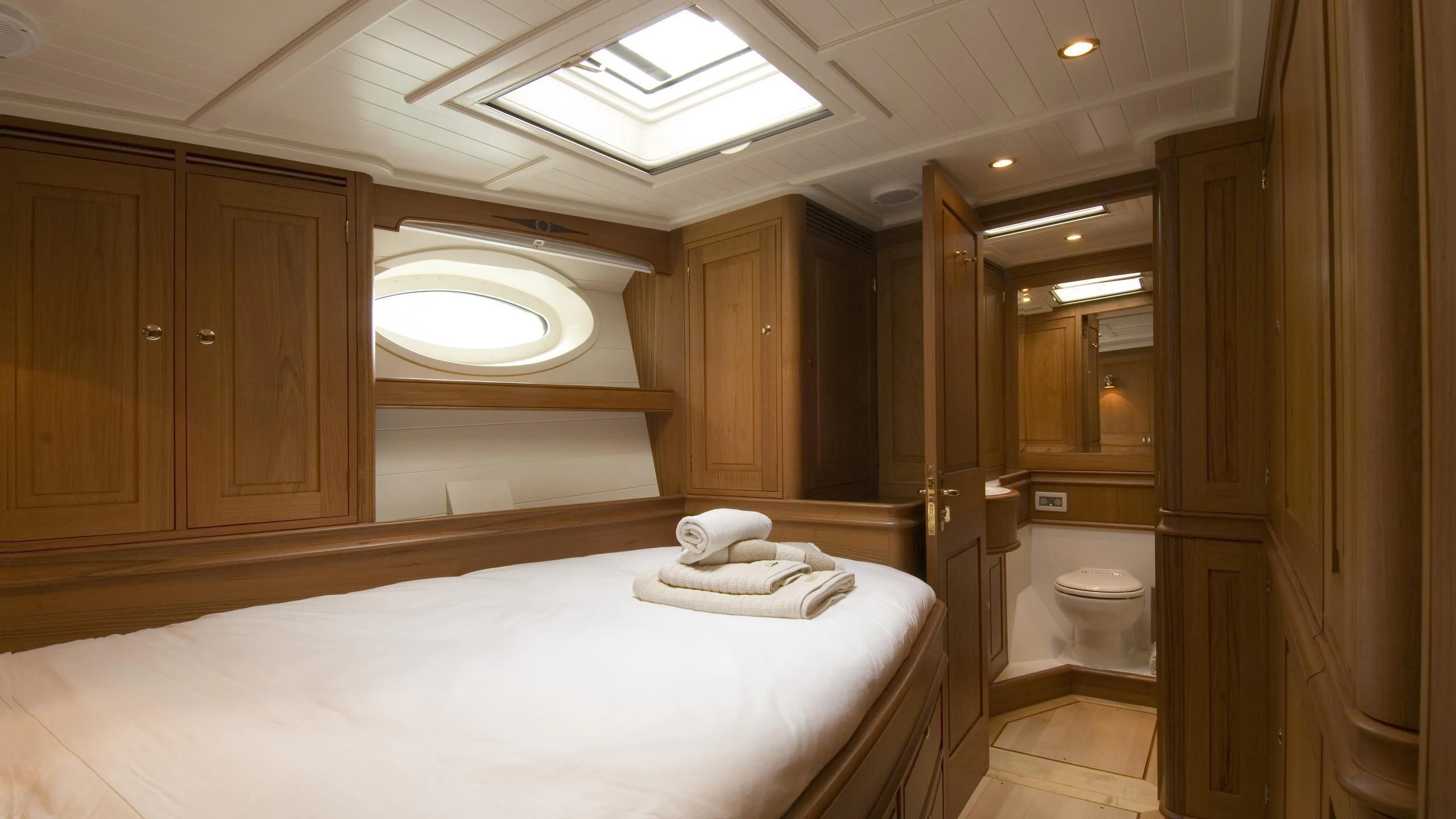 a large bathroom with a large bathtub aboard VELACARINA Yacht for Sale