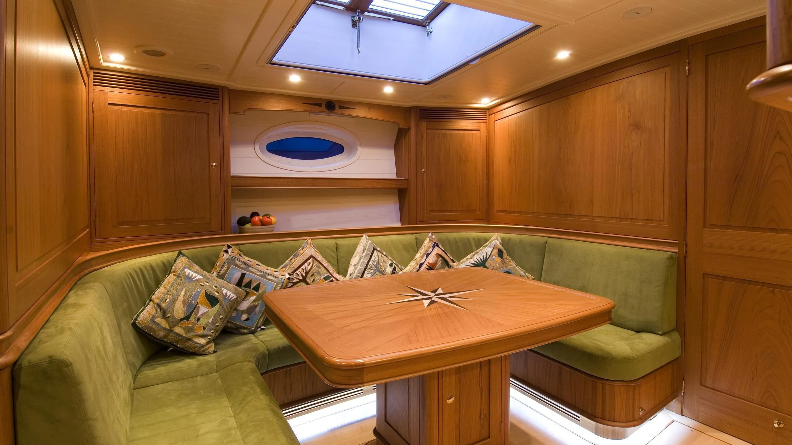 a room with a couch and a table aboard VELACARINA Yacht for Sale