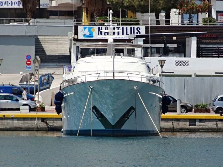 a large boat docked aboard IOVY Yacht for Sale
