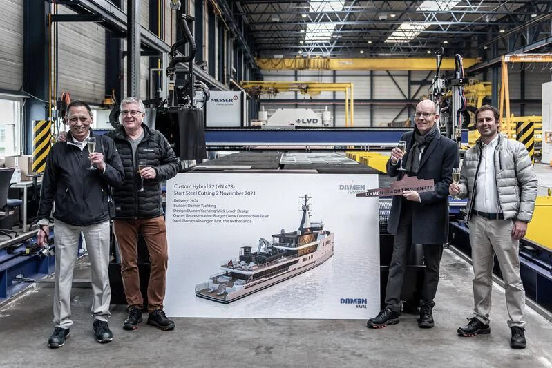 a group of people posing for a photo aboard DAMEN YACHTING CUSTOM HYBRID 75 Yacht for Sale