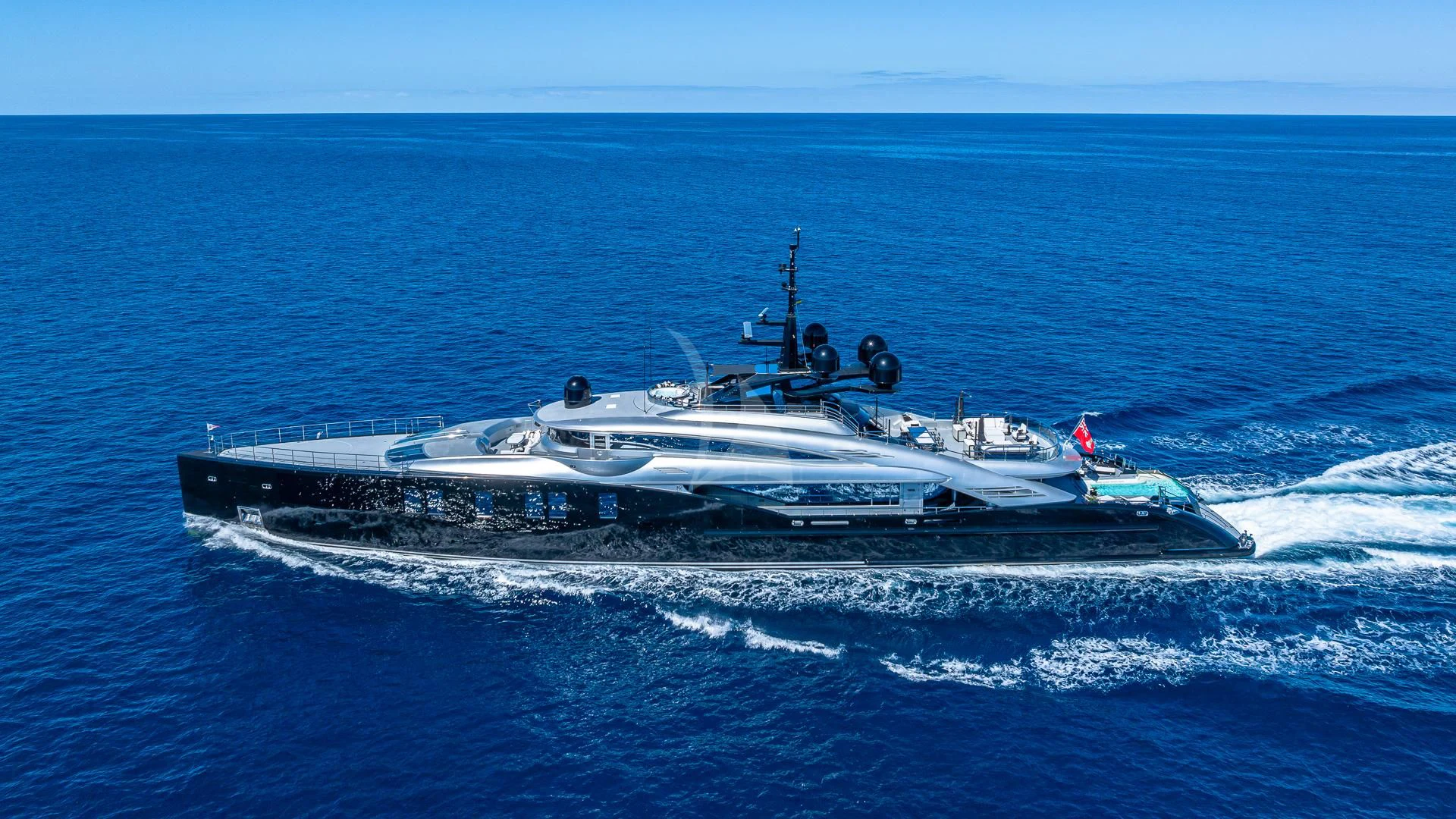 a military boat in the water aboard OKTO Yacht for Charter