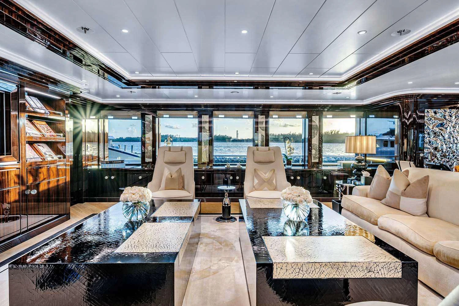 a living room with a large glass ceiling aboard OKTO Yacht for Charter