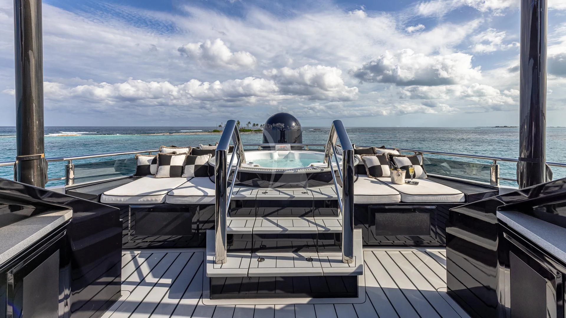 a deck with chairs on it aboard OKTO Yacht for Charter