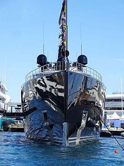 a large ship in the water aboard OKTO Yacht for Charter