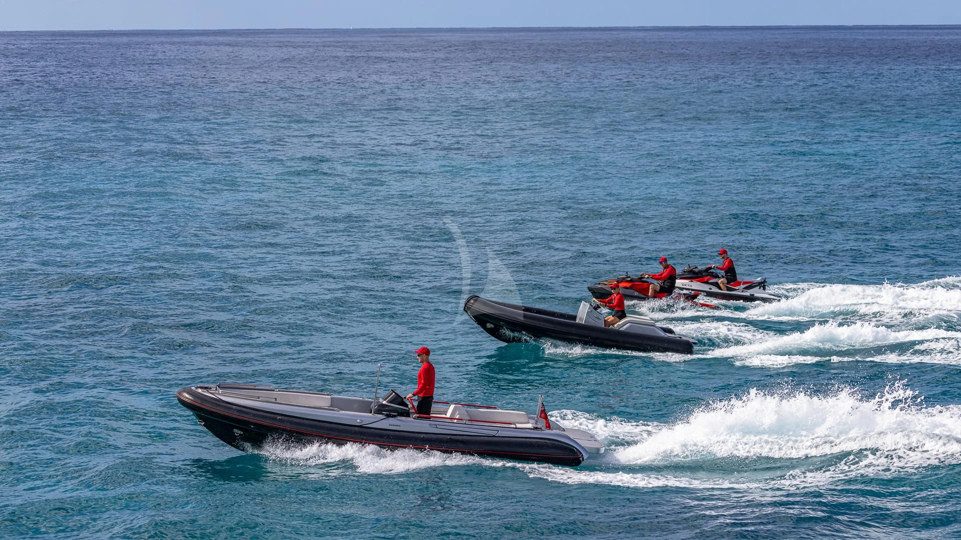 a group of people in a boat aboard OKTO Yacht for Charter