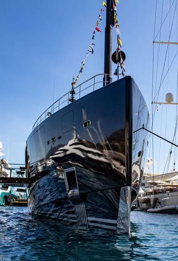 a large ship in the water aboard OKTO Yacht for Charter