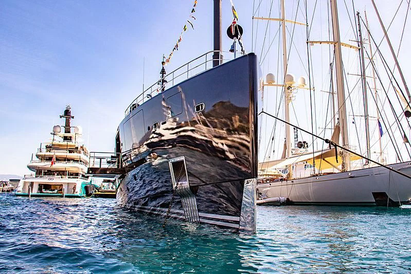 a couple of large sailboats in the water aboard OKTO Yacht for Charter