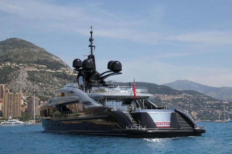 a large ship in the water aboard OKTO Yacht for Charter