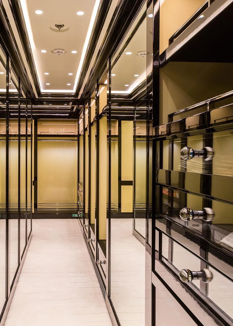 a large room with glass walls aboard OKTO Yacht for Charter