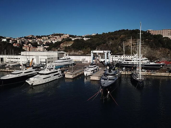 boats docked at a pier aboard OKTO Yacht for Charter