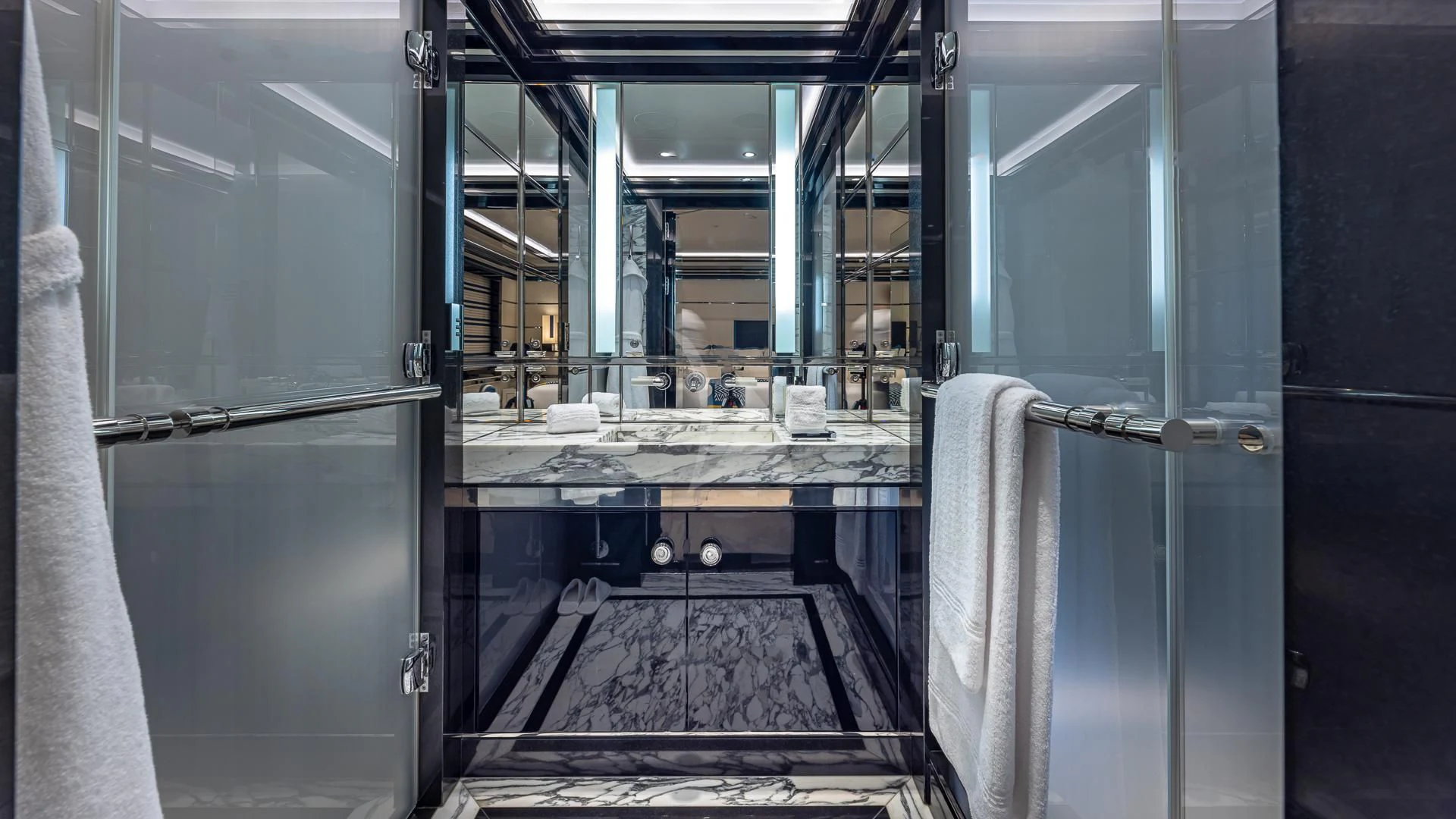 a room with a sink and a mirror aboard OKTO Yacht for Charter