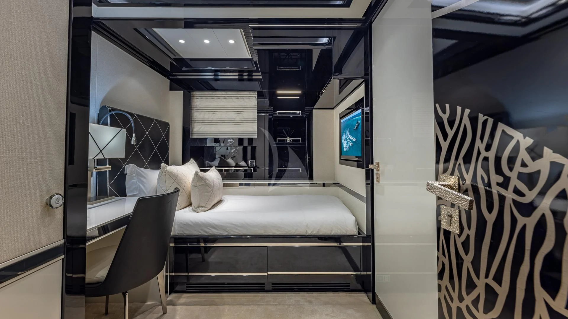 a bed in a room aboard OKTO Yacht for Charter