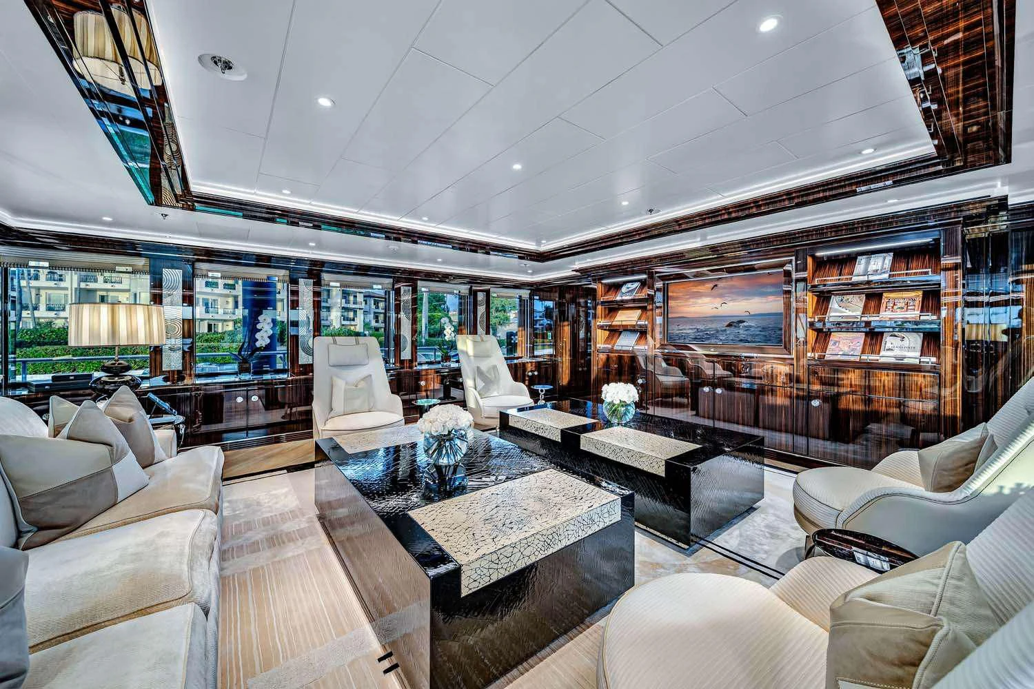 a room with a large glass wall aboard OKTO Yacht for Charter