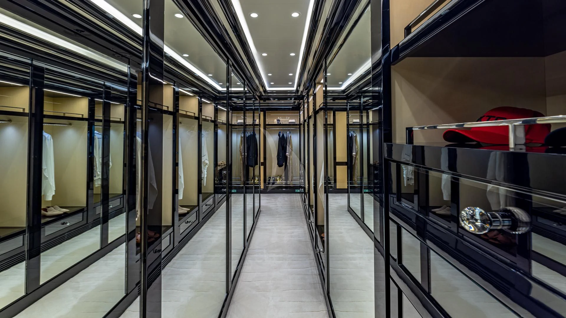 a hallway with glass doors aboard OKTO Yacht for Charter
