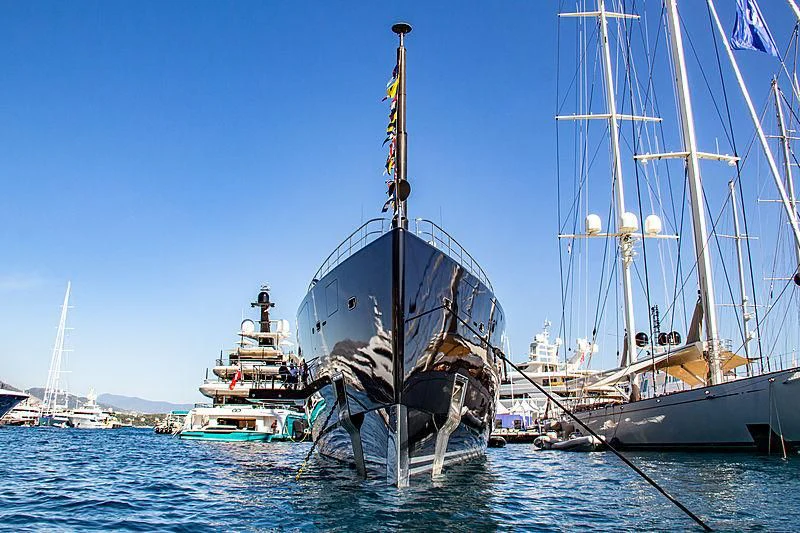a large boat is parked in the water aboard OKTO Yacht for Charter