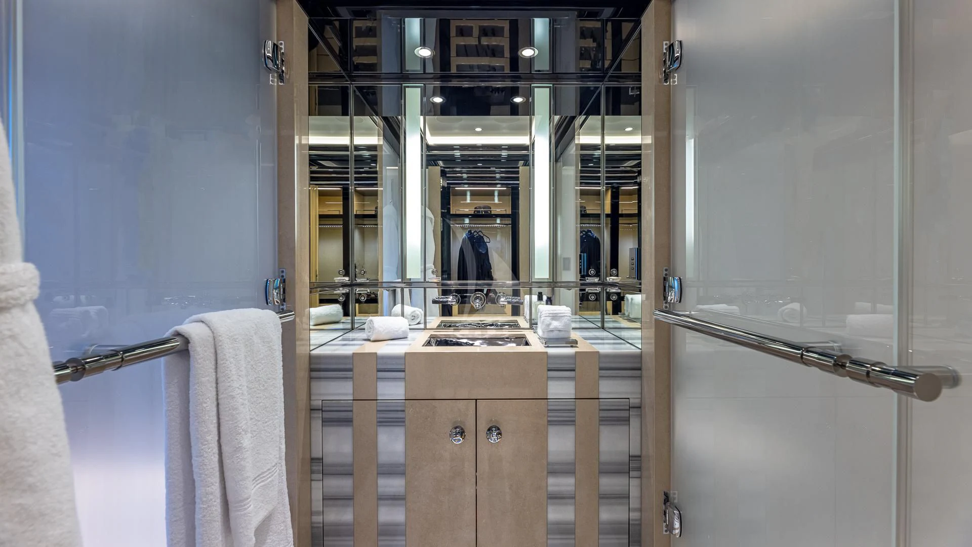 a bathroom with a sink and a mirror aboard OKTO Yacht for Charter