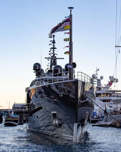 a large ship in the water aboard OKTO Yacht for Charter