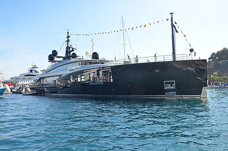 a large ship in the water aboard OKTO Yacht for Charter