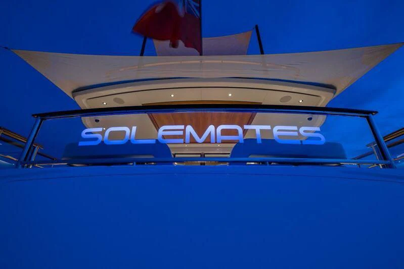 a blue and white boat aboard SOLEMATES Yacht for Sale
