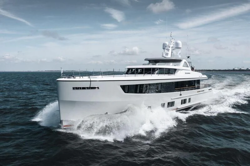 a white boat on the water aboard SOLEMATES Yacht for Sale