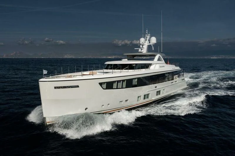 a white boat on the water aboard SOLEMATES Yacht for Sale