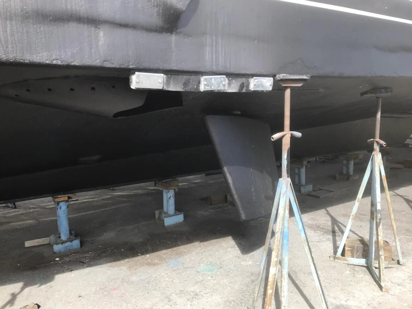 a large black airplane with a few ladders and a ladder aboard MON SHERI Yacht for Sale