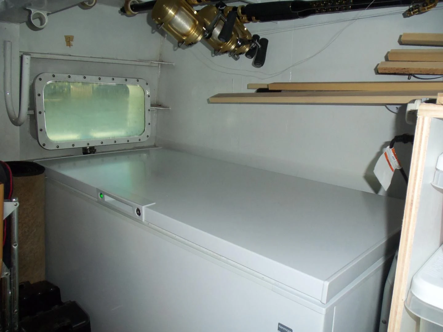a white machine with a light on the side aboard MON SHERI Yacht for Sale