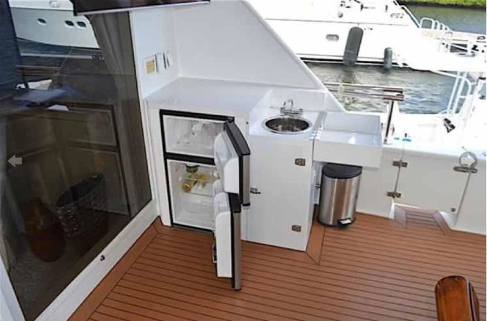 a kitchen with a large deck aboard MON SHERI Yacht for Sale
