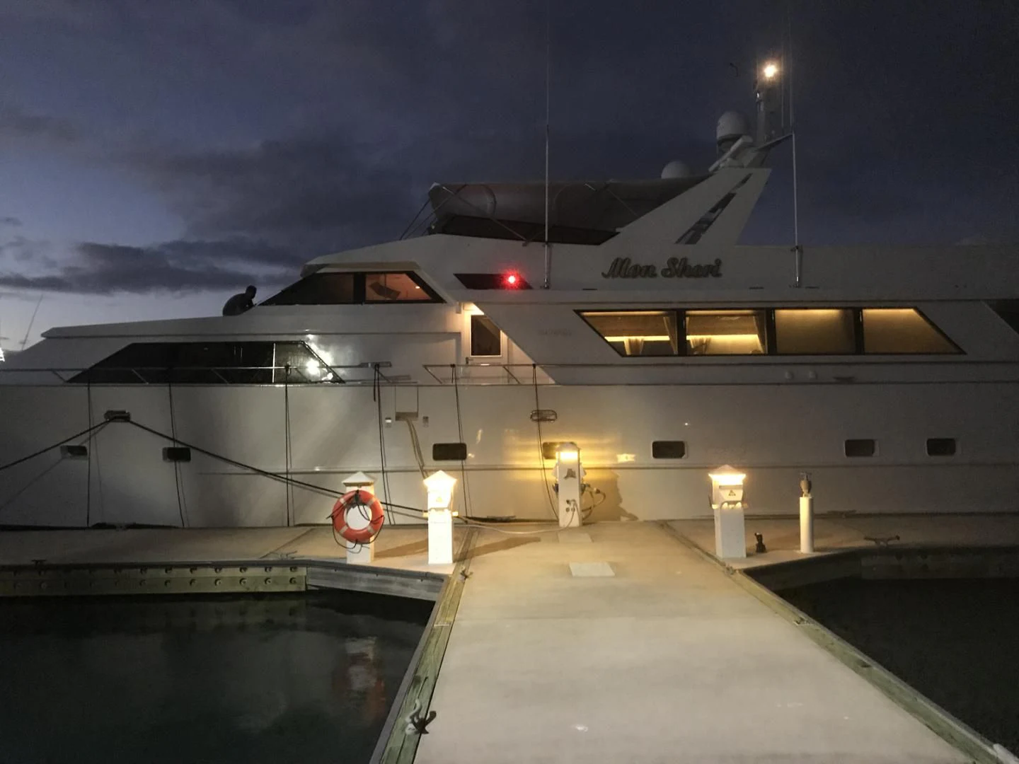 a large ship with a red light aboard MON SHERI Yacht for Sale