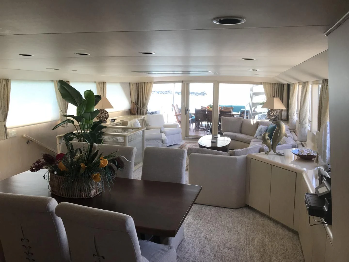 a living room with a large window aboard MON SHERI Yacht for Sale
