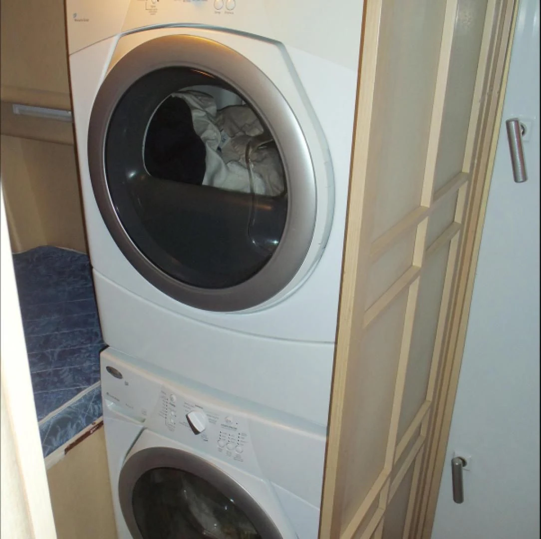 a washing machine with a black seat aboard MON SHERI Yacht for Sale