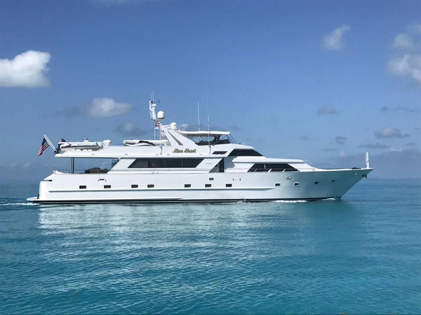 a white yacht in the water aboard MON SHERI Yacht for Sale