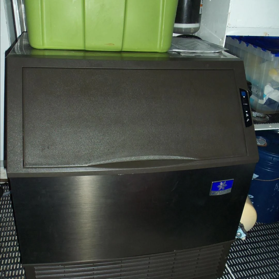 a silver and black refrigerator aboard MON SHERI Yacht for Sale