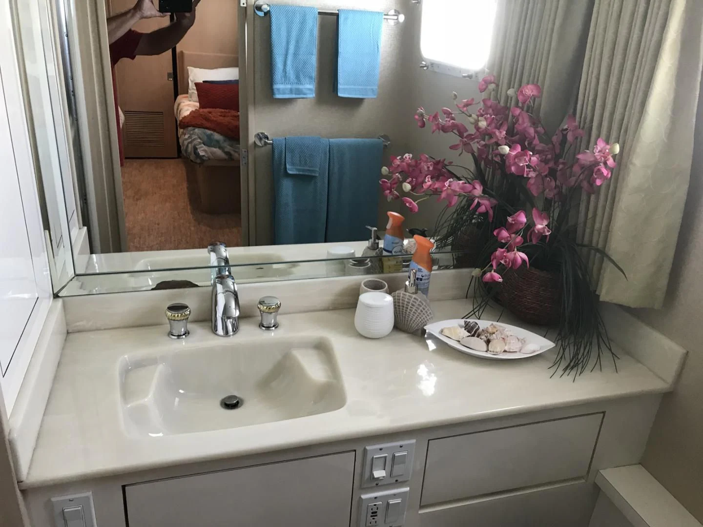 a bathroom with a sink and mirror aboard MON SHERI Yacht for Sale