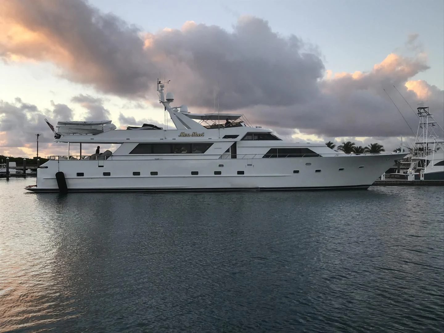 a white yacht in the water aboard MON SHERI Yacht for Sale
