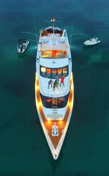 a white and orange ship on water aboard HEARTBEAT OF LIFE Yacht for Sale