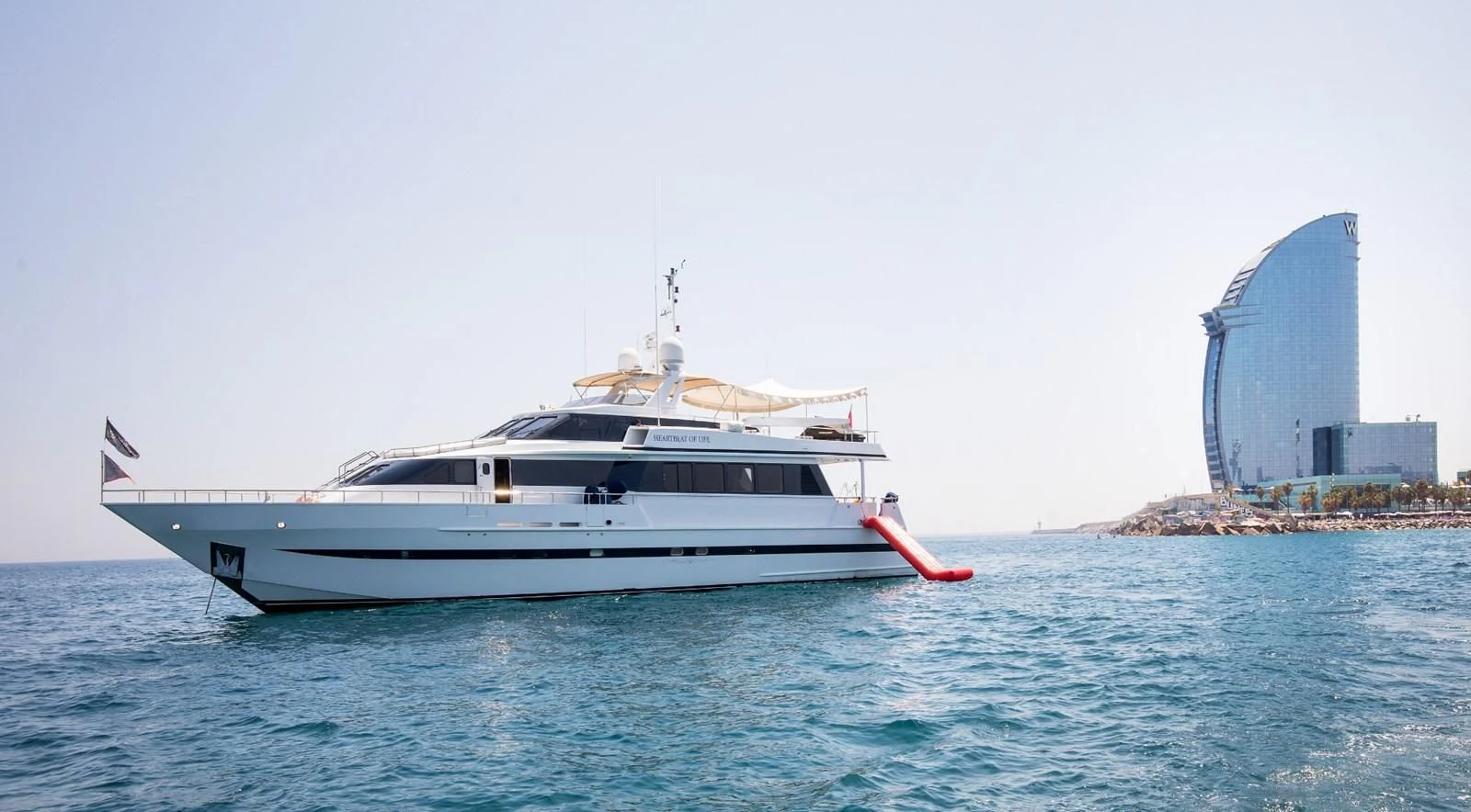 a boat in the water aboard HEARTBEAT OF LIFE Yacht for Sale