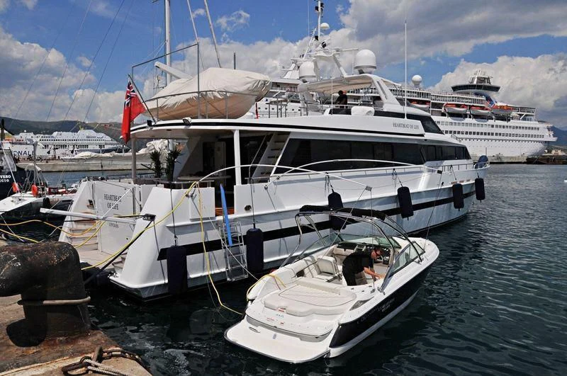a boat docked at a pier aboard HEARTBEAT OF LIFE Yacht for Sale