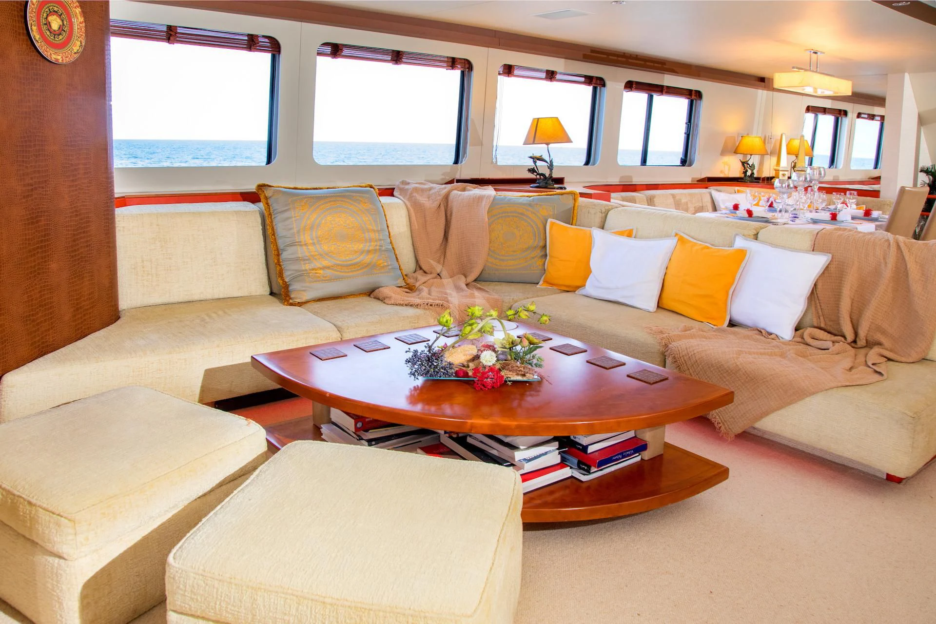 a living room with a couch and a coffee table aboard HEARTBEAT OF LIFE Yacht for Sale
